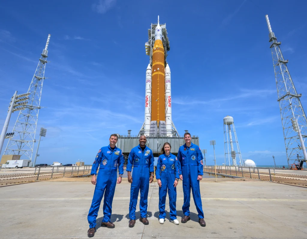Artemis II astronauts Reid Wiseman, Victor Glover, Christina Koch, and Jeremy Hansen photographed together at Launch Complex 39B two days before their April 1, 2026 launch to the Moon